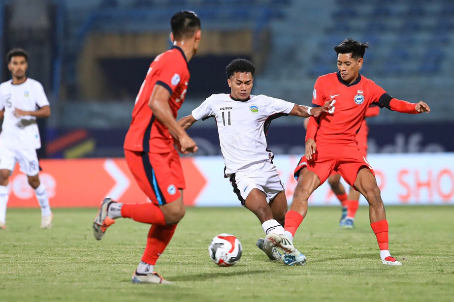 AFF Cup 2024: Thua đau Singapore, Đông Timor chính thức bị loại - Ảnh 1. AFF Cup 2024: Thua đau Singapore, Đông Timor chính thức bị loại - Ảnh 1.
