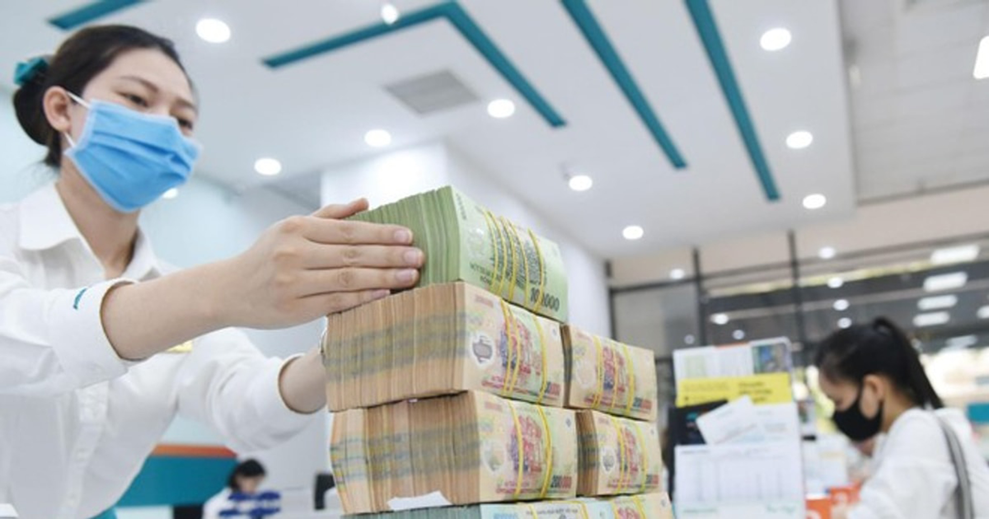 Băn khoăn đánh thuế tiền lãi tiết kiệm- Ảnh 1.